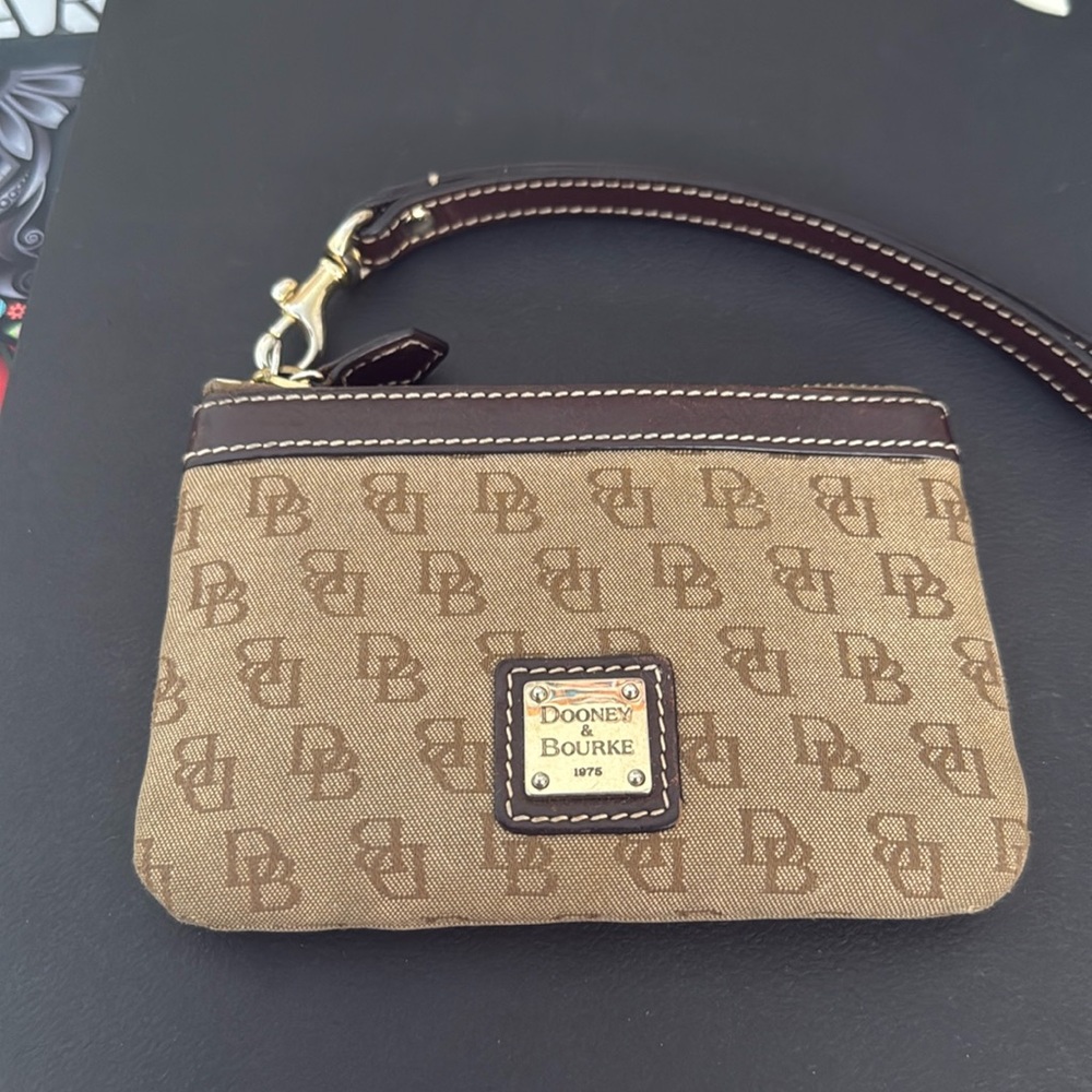 Dooney & Bourke wristlet. Brand new condition.